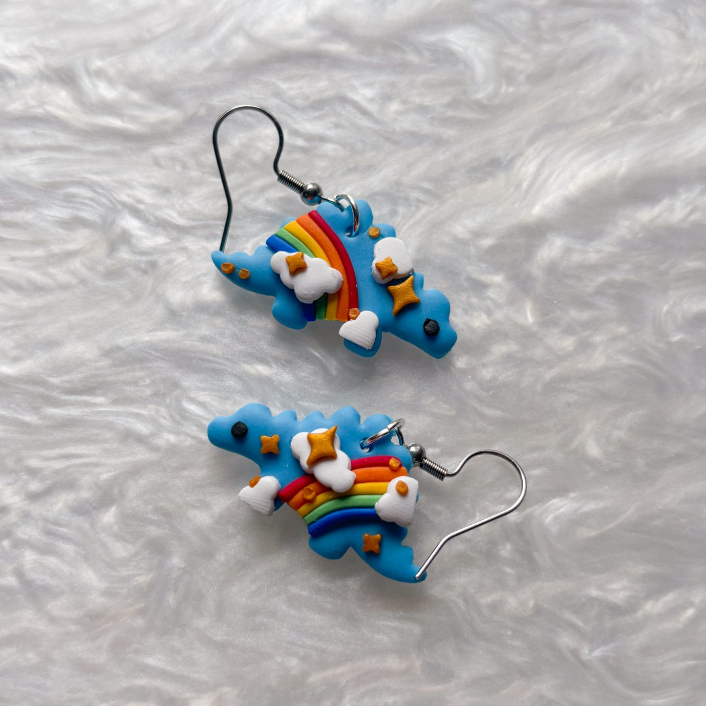 RAINBOW DINO EARRINGS (STEGOSAURUS)