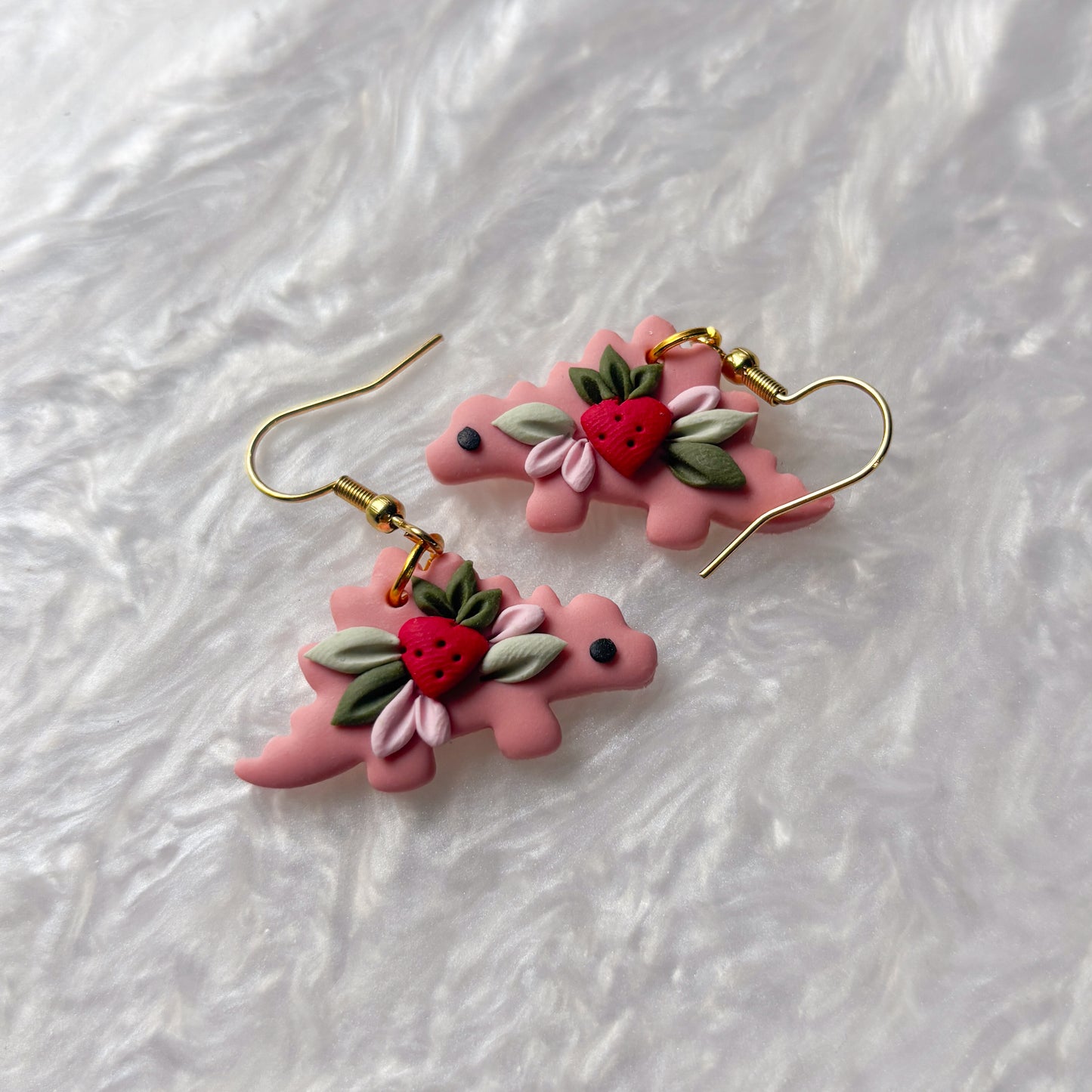 STRAWBERRY DINO EARRINGS (STEGOSAURUS)