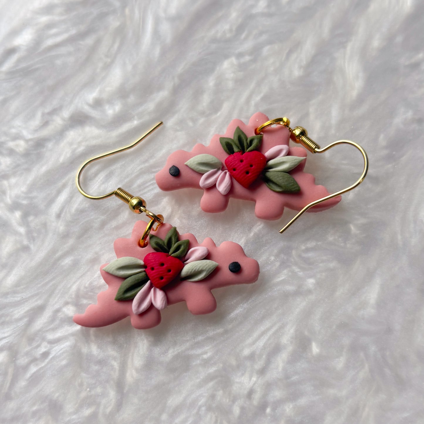 STRAWBERRY DINO EARRINGS (STEGOSAURUS)