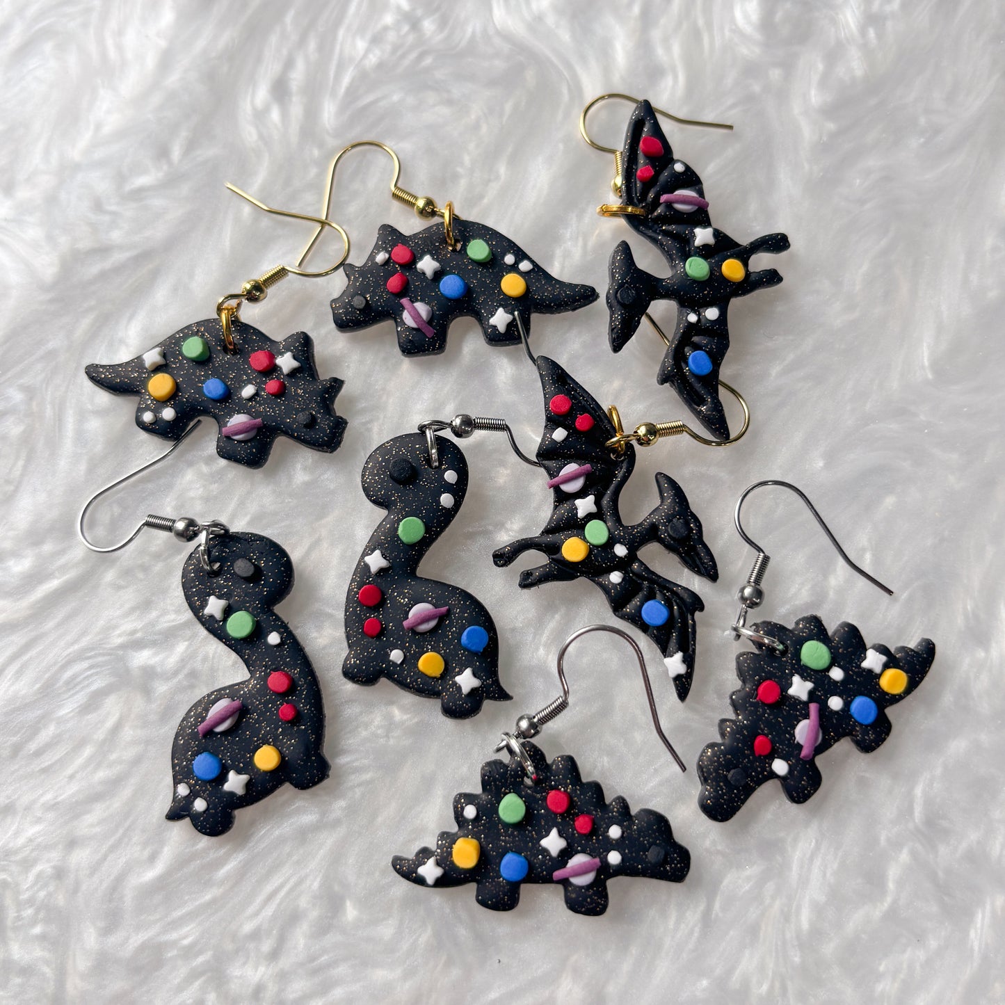SPACE DINO EARRINGS (TRICERATOPS)