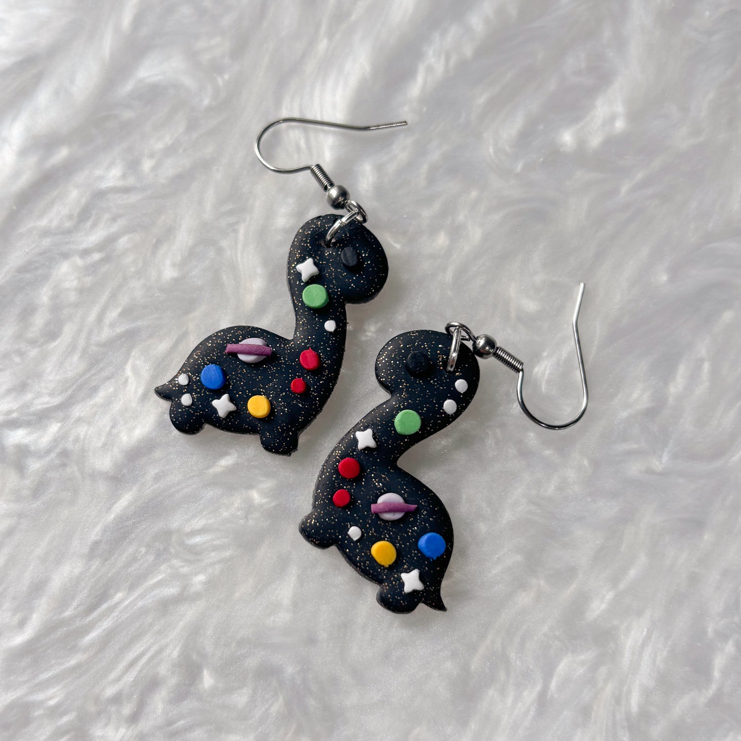 SPACE DINO EARRINGS (BRONTO)