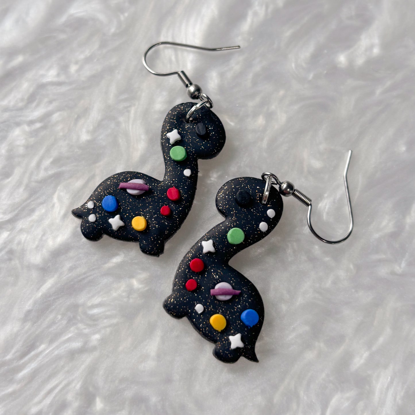 SPACE DINO EARRINGS (BRONTO)