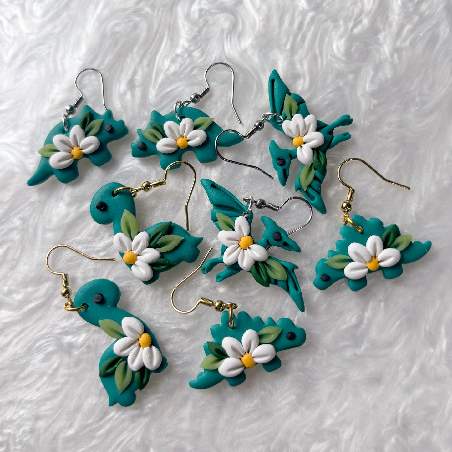 DAISY DINO EARRINGS (TRICERATOPS)