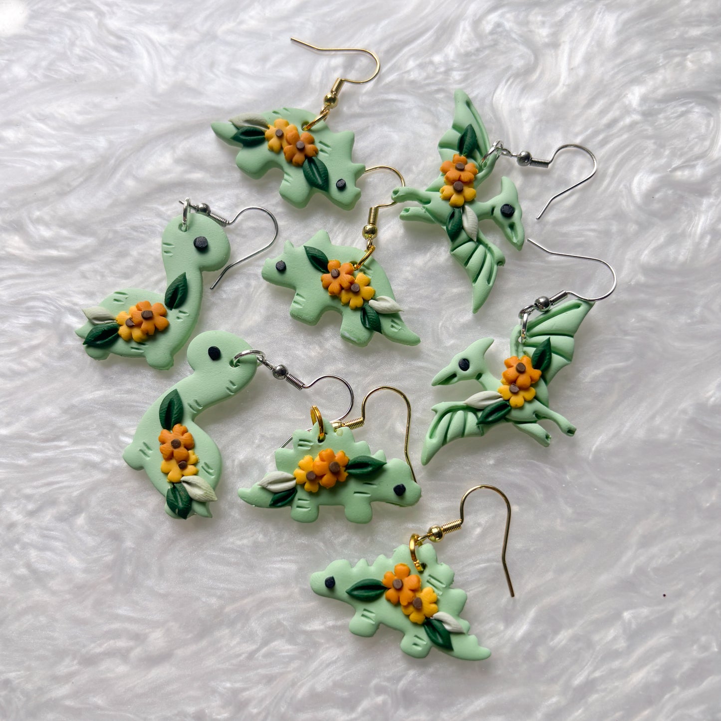 SUNFLOWER DINO EARRINGS (STEGOSAURUS)