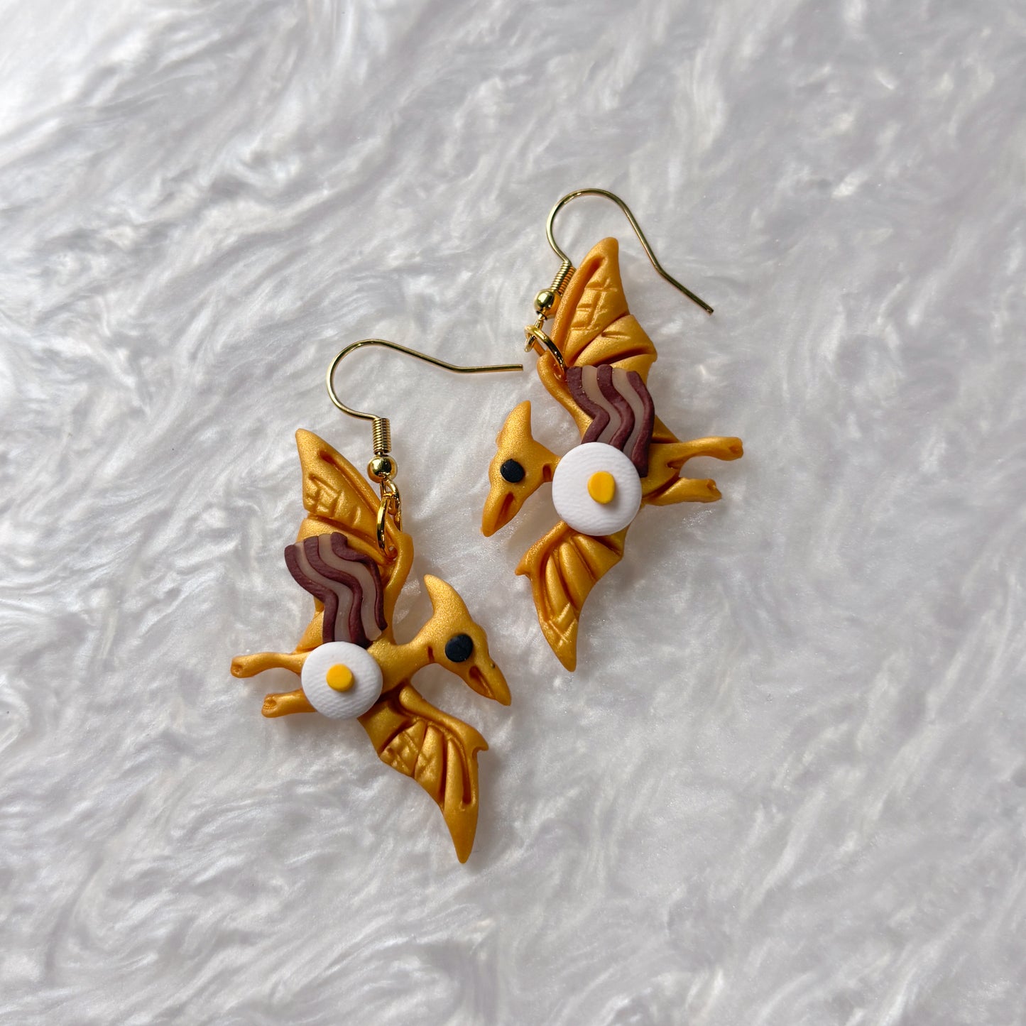 BREAKFAST DINO EARRINGS (PTERODACTYL)
