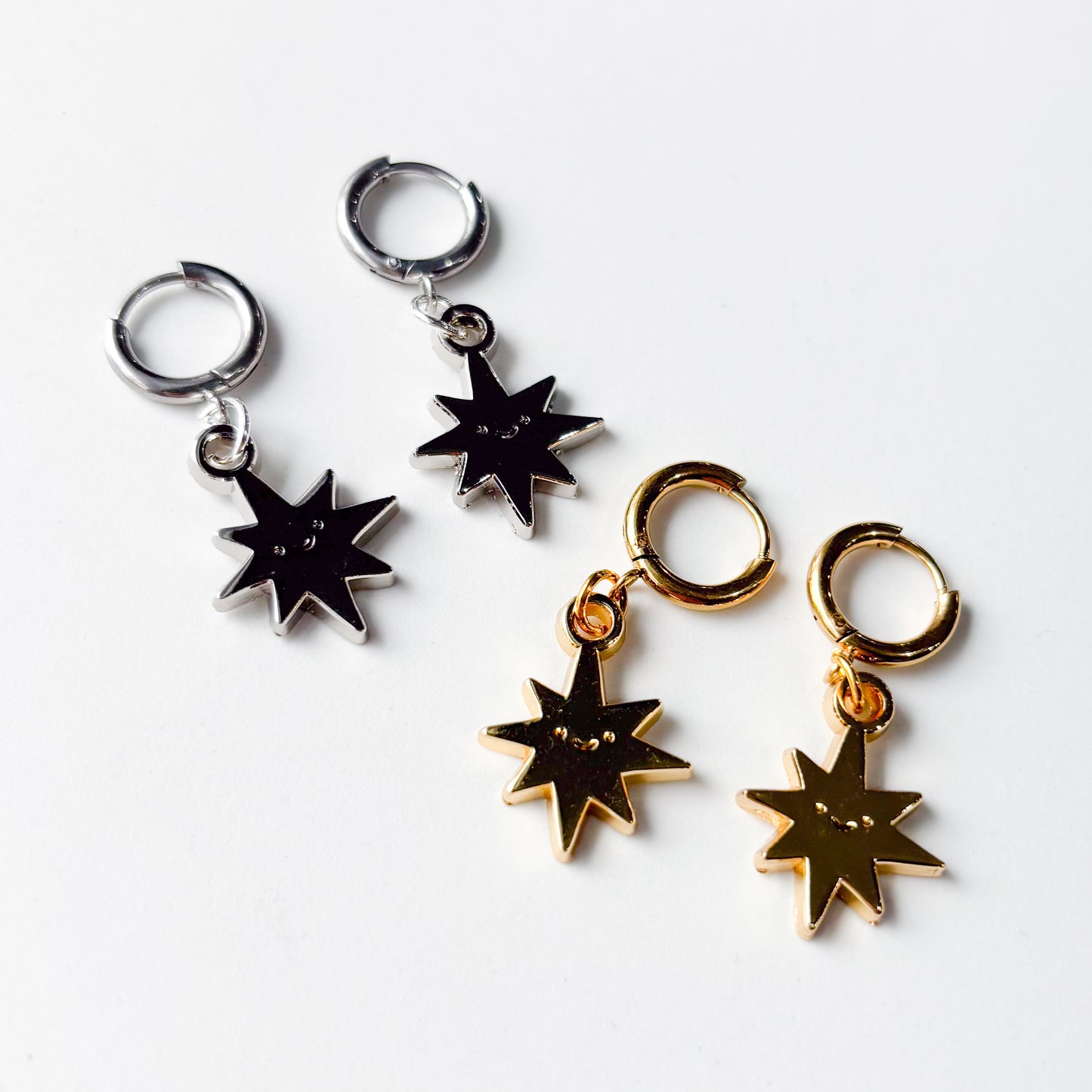 SMILING SPIKY STAR METAL HUGGIE HOOP EARRINGS