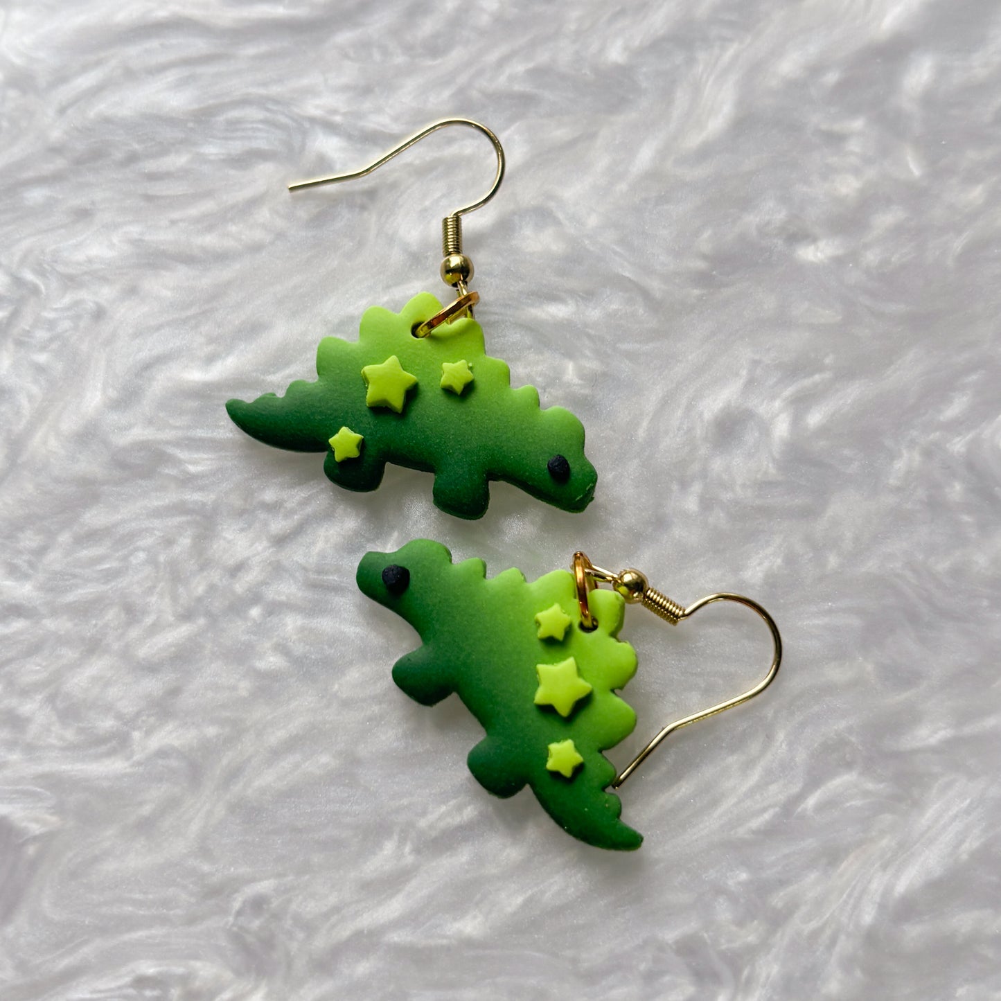 GRADIENT GREEN WITH STARS DINO EARRINGS (STEGOSAURUS)