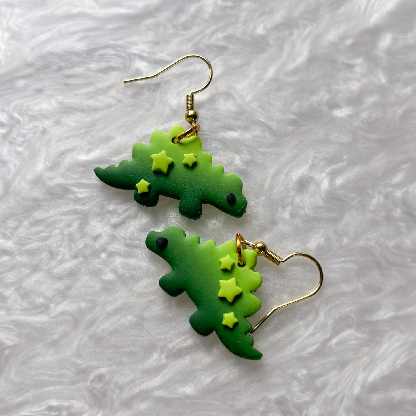 GRADIENT GREEN WITH STARS DINO EARRINGS (STEGOSAURUS)